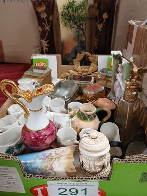 a box full of assorted items for sale on the table