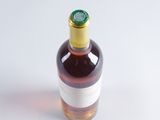 a bottle of wine that is sitting on a table