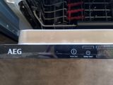 an image of a dishwasher with the door open