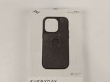 the back of a black phone case sitting on top of a white box