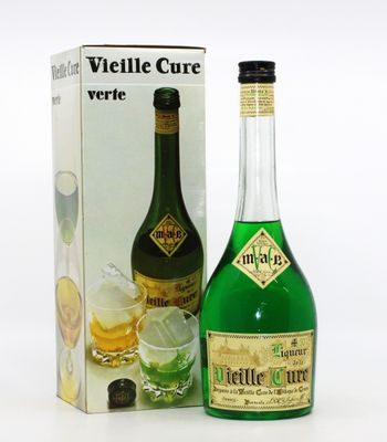 bottles of alcohol and a box of liquor on a white surface