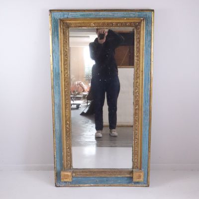 a person taking a picture of themselves in a mirror