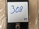 a picture of a wallet with a note attached to it