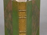 a book that is open to show a green cover