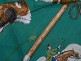 a picture of a dog and a stick on a table cloth