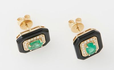 an image of a pair of emerald and diamond earrings