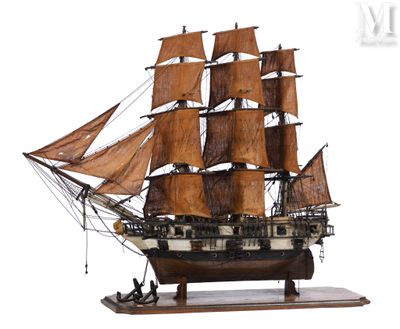 a model of a sailing ship on a wooden stand