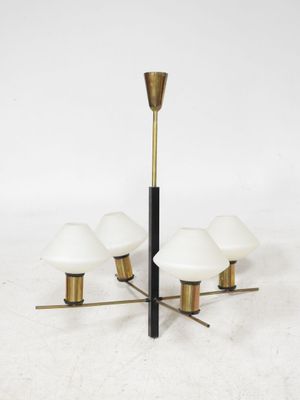 a brass and glass chandelier with five lamps