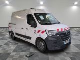 a white van with red stripes parked in a room
