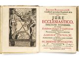 un vieux livre sur lequel figure l'image d'un homme et d'une femme