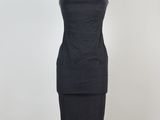 une robe noire sur un mannequin mannequin mannequin mannequin mannequin mannequin mannequin mannequin mannequin mannequin