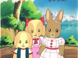 Trois lapins de dessin animé sont debout les uns à côté des autres devant un lac.