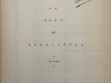 un livre ouvert sur lequel figurent des notes manuscrites et une note écrite à la main