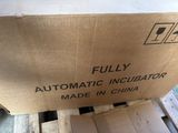 a cardboard box that is sitting on top of a pallet
