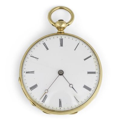 an old gold pocket watch with roman numerals and roman numerals on the face