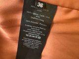 a close up of the label on a dress
