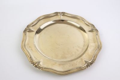 an antique silver plate on a white background