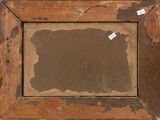 an old picture frame with a piece of paper taped to it