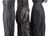 three dresses on a mannequin stand on a white background