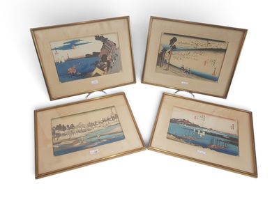 three framed japanese prints of a man and a woman on a beach