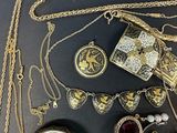 many different types of jewelry on the table