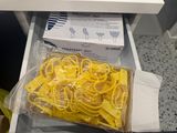 a box of pasta noodles in the drawer of a kitchen
