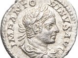 a silver coin with an image of a man on it