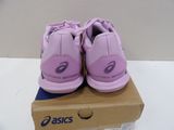 purple tennis shoes in a box on a white surface