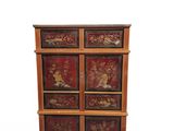an image of a wooden chest of drawers with birds and flowers on it