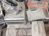 a lot of tools that are sitting on the floor