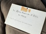 a close up of a piece of clothing with a tag attached to it