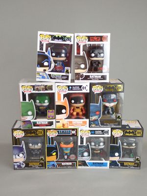 batman pop vinyl figures are stacked on top of each other