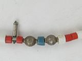 an image of a red, white, and blue necklace with a silver clasp