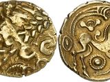 a gold coin with an image of a horse on it