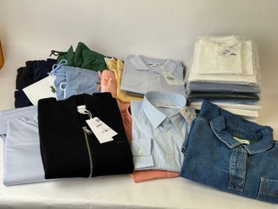 a lot of clothes that are on a table