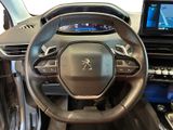the interior of a car with a steering wheel and dashboard controls