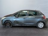 the grey car is parked in the showroom with its door open
