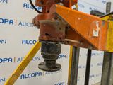 an image of a machine that is working on a piece of machinery