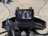 a close up of a motorcycle with a speedometer on it ' s dashboard