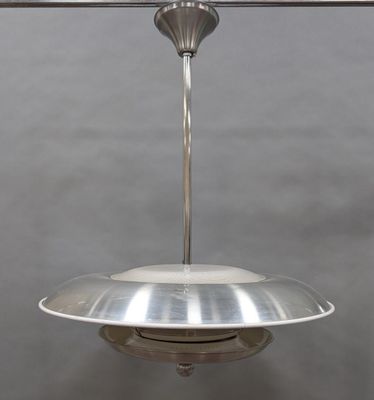 an image of a ceiling lamp hanging from the ceiling