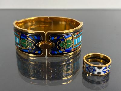 two rings that are sitting next to each other on a table