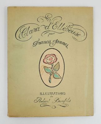 an old book with a drawing of a rose on it