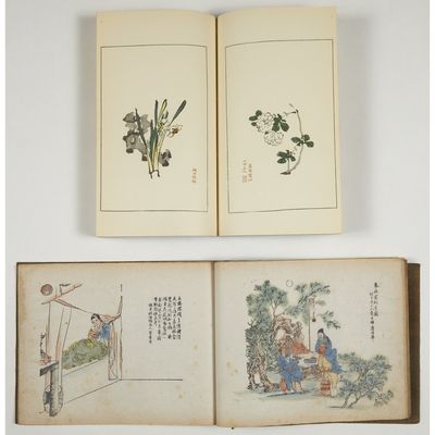 an open book with a picture of a man and a woman sitting on a bench
