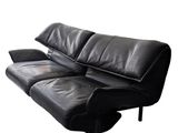 an image of a black leather couch on a white background