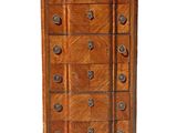an image of a tall chest of drawers with drawers