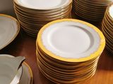 a lot of plates that are on a table