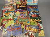 a lot of comic books that are on the table