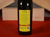 a bottle of wine that is sitting on a table