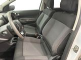 the interior of a car with two seats and a steering wheel