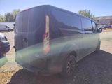 a black van that is parked in a lot